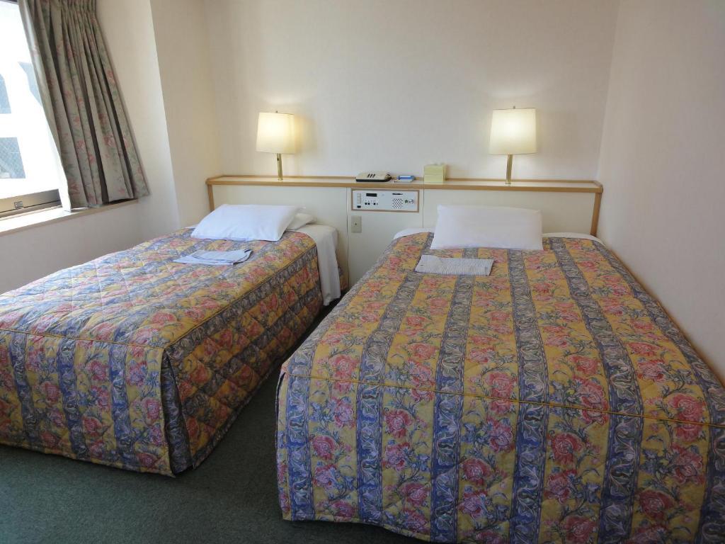 Hiroshima Rich Hotel Rum bild